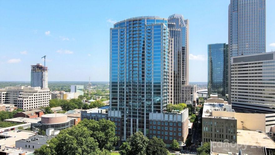 Welcome to the Avenue! Discover urban living at its finest in this sleek 1 bed, 1 bath condominium that is ideally situated in the heart of Charlotte's Uptown district. Built in 2007, this residence boasts a clean and well-planned floorplan, offering both style and functionality. Step into a contemporary oasis with an open-concept living. The interior welcomes you with a clean aesthetic, featuring neutral tones throughout. Take in breathtaking views of the Charlotte skyline from your private balcony, creating a perfect spot to unwind and enjoy the city lights. Residents enjoy access to a range of amenities, including a secured parking, fitness center, rooftop terrace, and concierge services. Explore the nearby cultural gems such as the Blumenthal Performing Arts Center, Bank of America Stadium, Spectrum Center, Queen City Quarter, and Monarch Market food hall that opened up just a block away. The location also offers easy access to major highways for quick commuting.