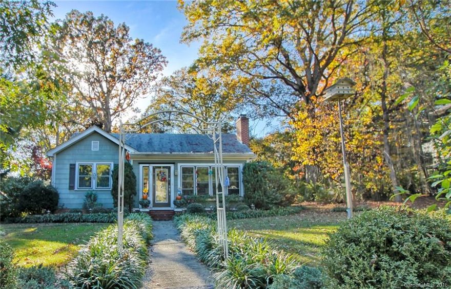 Picture perfect Beverly Hills cottage on a magical double lot.  Newer roof, updated kitchen and baths, vintage hardwood floors, bright sunroom, breakfast room overlooking private back gardens.  Deck for entertaining and grilling on main level.  Backyard is like a park with lots of room for exploration, gardening, or just enjoying nature.  Fantastic street in great neighborhood.  Space in basement for workshop, garage, and room used as studio.  Just one lot away from Beverly Hills golf course.