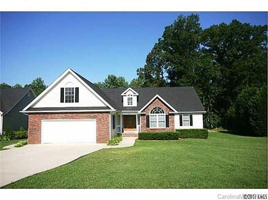 Don't miss this charming, open floor plan custom home w/over 2050 sq ft. Home features 3 full BRs & 2 full BAs on main & bonus or 4th BRm and 3rd full BA above your spacious 2 car garage. Great room has HW flrs & a gas FP, opening into the screened porch overlooking the pool. Over 870 sq ft of unfinished walk-in attic space awaits expansion or storage needs. Yard is 1.43 acres of low maintenance landscaping with a park like atmosphere including your own bridge over the natural running creek.