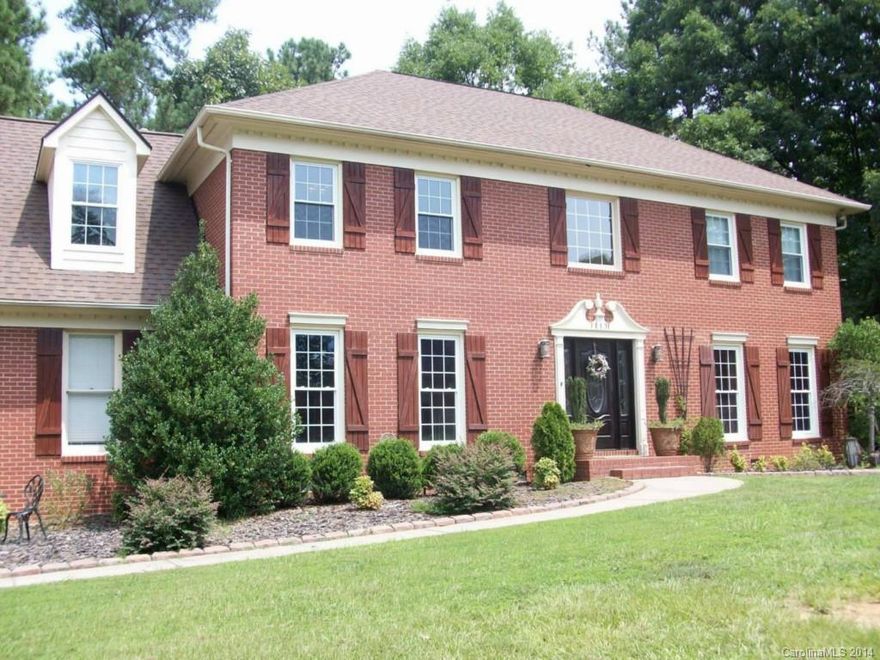 Custom all brick home in the Resort Town of Tega Cay!Custom kitchen and bath cabinets and granite counters, large kitchen island, wood floors and tile throughout, pillars, bonus room off Master along with private staircase to the main level, large wooded lot with a portion of the backyard fenced, huge screened porch and open deck with views of the deer and wildlife. New roof, new hot water heater, new hvac ducting and tons of upgrades!Swimming, golf, lake access, beach, parks, trails, new school