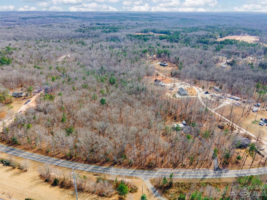 Unlock the potential of 4+ acres of prime land, a sprawling canvas eagerly awaiting the realization of your dream home. Are you ready to turn your vision into reality? This expansive parcel provides the perfect opportunity to craft a residence in a tranquil setting, where the possibilities are as boundless as your imagination. Embrace the chance to build the home you've always envisioned on this remarkable piece of land, creating a sanctuary that perfectly aligns with your lifestyle and aspirations!