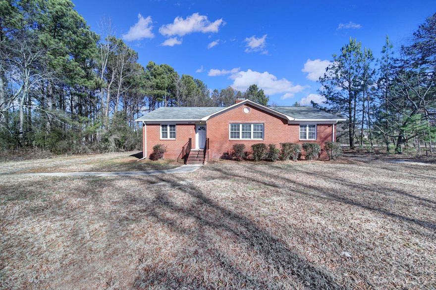 Welcome home to this charming 3 bed 1 bath all brick ranch home in Matthews. Sitting on approximately 4 acres, this home has more than enough yard space and privacy. In the back yard sits a two car detached garage to satisfy all your parking and storage needs. This home is located just minutes from shopping, dining, and entertainment options.