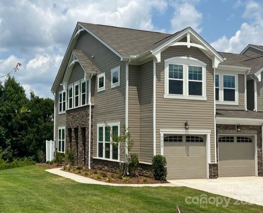 Charming 3 bed, 2.5 bath townhome in the sought-after Indian Land area.  This unique home continues to stun, as it has a 2 car garage, along with a loft upstairs, and a huge pantry in the kitchen.  What a great use of space!  Protected wetland behind the home, fantastic views!  Benefit from proximity to top-rated educational institutions, providing a quality learning environment for residents. with proximity to shopping and dining.  This quality residence features a spacious floor plan, modern kitchen with stainless steel appliances.  Perfect for comfortable and convenient living.  Hope to see you soon!