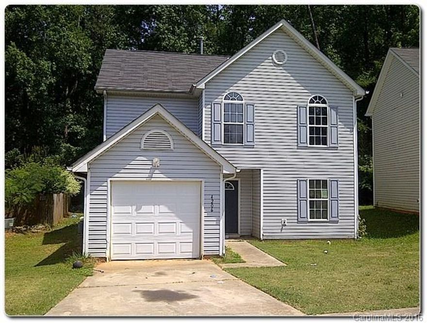 2 Story home in Thriftwood Subdivision! Lot backs up to wooded area, interior has a great floor-plan in need of TLC. Upper level has Large bedrooms with trey ceiling in master suite and vaulted ceilings in one of the secondary bedrooms. Walk to Tuckaseegee park!
