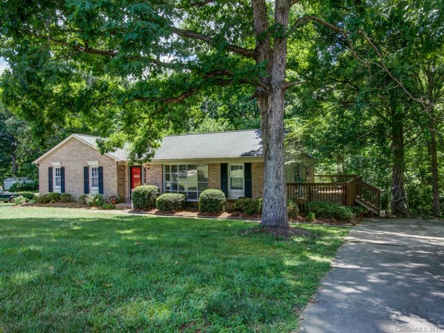 Newly Updated Ranch in Great Location. This adorable home features new carpet, paint, new lighting & hardware throughout, all new appliances, new vinyl flooring. Natural stone wood burning fireplace and built-in bookcases in the family room. Roof was replaced in 2012. Vinyl windows. HVAC replaced in 2012. Enjoy the privacy of the wooded backyard. Detached garage/workshop space. Large lot with private backyard which backs up to the creek. Gutters with gutter guards. Home Warranty is included.