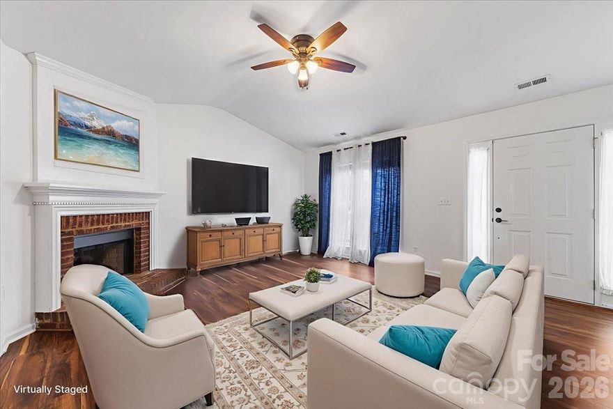 Welcome home to this charming 3-bedroom, 2-bath home in The Crossings at Steele Creek! The inviting family room has vaulted ceilings and a cozy fireplace, creating a warm and open gathering space. The updated kitchen features stainless steel appliances, modern light fixtures, and a bright dining room. The oversized primary suite has vaulted ceilings with a walk-in closet and a beautifully renovated bathroom. Fresh interior paint (2026) and new bedroom carpet (2026) provide a move-in ready feel, while the spacious laundry room adds everyday convenience. Step outside to a private backyard complete with a new fence and a storage shed that conveys with the home. Residents enjoy community amenities including an outdoor pool, clubhouse, playground, recreational areas, and walking trails. Ideally located near shopping, dining, and the airport, this home combines comfort, style, and convenience in one exceptional package.