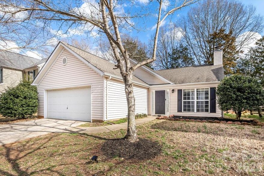 Welcome home to this charming 3-bedroom, 2-bath home in The Crossings at Steele Creek! The inviting family room has vaulted ceilings and a cozy fireplace, creating a warm and open gathering space. The updated kitchen features stainless steel appliances, modern light fixtures, and a bright dining room. The oversized primary suite has vaulted ceilings with a walk-in closet and a beautifully renovated bathroom. Fresh interior paint (2026) and new bedroom carpet (2026) provide a move-in ready feel, while the spacious laundry room adds everyday convenience. Step outside to a private backyard complete with a new fence and a storage shed that conveys with the home. Residents enjoy community amenities including an outdoor pool, clubhouse, playground, recreational areas, and walking trails. Ideally located near shopping, dining, and the airport, this home combines comfort, style, and convenience in one exceptional package.