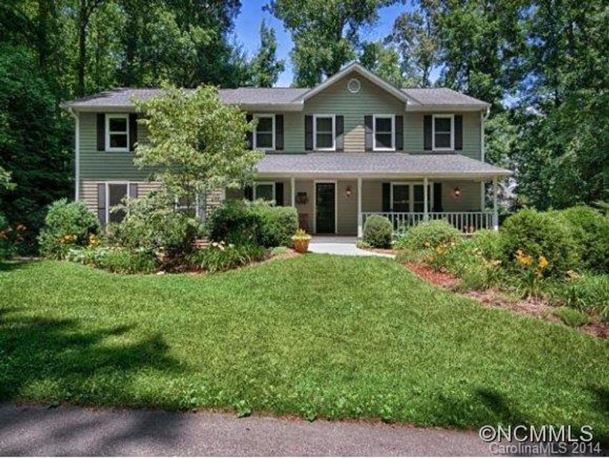 Nearly 4200 sq ft of high end finishes is nearly unheard of at this price in the South Asheville area. Remodeled and updated, this home boasts hardwood floors, silestone counters, a huge great room/keeping room area with fireplace. Massive family room with fireplace, open floor plan, eat-in kitchen area + formal dining room. 2 master suites with fabulous baths and walk-in closets. Level 1/2 acre is professionally landscaped. This will sell fast!