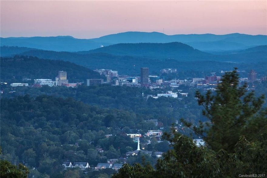 Large and level 0.80 acre lot in Ventana! This is the perfect site for your new mountain home.  Enjoy year round views of downtown Asheville, and southern orientation for full sun, and level building site for easy building process.  Call listing agent for more information!