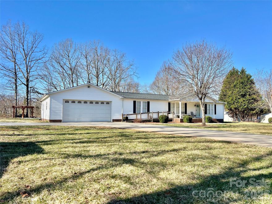 Beautifully maintained home featuring a welcome covered front porch that opens into a small foyer with a formal dining room. The vaulted living room offers a cozy gas fireplace flanked by built in nooks, creating a warm and inviting gathering space. The spacious primary suite includes a large walk-in closet and a well appointed en-suite bath with dual vanities, a separate shower, and a linen closet. The kitchen is thoughtfully designed with an arched seating area overlooking the living room and features gunmetal stainless steel appliances. A pantry provides ample storage. Just off the kitchen is a convenient laundry area leading into a bright four-season sunroom with heating and cooling and abundant windows. The double garage offer another utility room for more storage.  Out back is a little fire pit area great for cool evenings with friends and family.