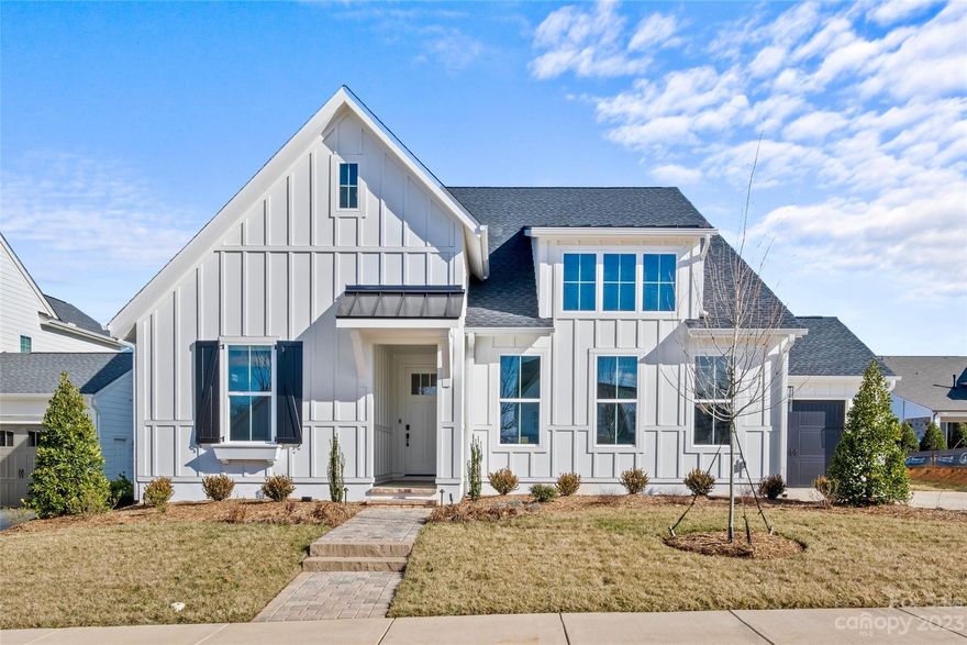 One-of-a-kind, perfectly finished new construction home in super popular Huntersville, with ultra rare primary suite options on the main AND upper levels! Loaded with upgrades and every finish thoughtfully chosen, this home features: custom California Closets in both primary closets, refrigerator drawers, Sonic ice maker, bar fridge, AV surround sound Sonos, double washer & dryers included, personal TVs in most bedrooms (also included!), stunning stone patio with motorized, custom screens to open & close on a whim! Accordion doors extend living area to the outdoor fireplace & flat backyard - perfect for anything you can imagine, including a possible custom pool! Four main bedrooms specifically chosen to have their en suite baths, loft space upstairs with another bar area (and TV!). Neighborhood amenities include playground, fire pit & covered recreational area w/ Big Green egg grill. Tranquil, tree-lined neighborhood entrance just off Sam Furr Road and close to Birkdale! A MUST SEE!