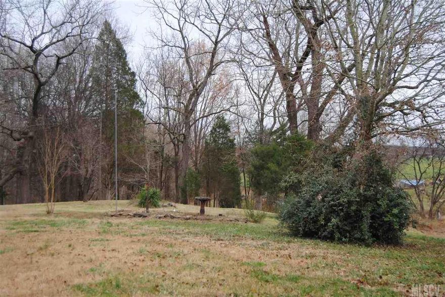 Sold AS-IS, this property has a large private lot in Coolwood Subdivision. Great deal! Septic system & county water. Seller makes no representation as to manufactured home on property.