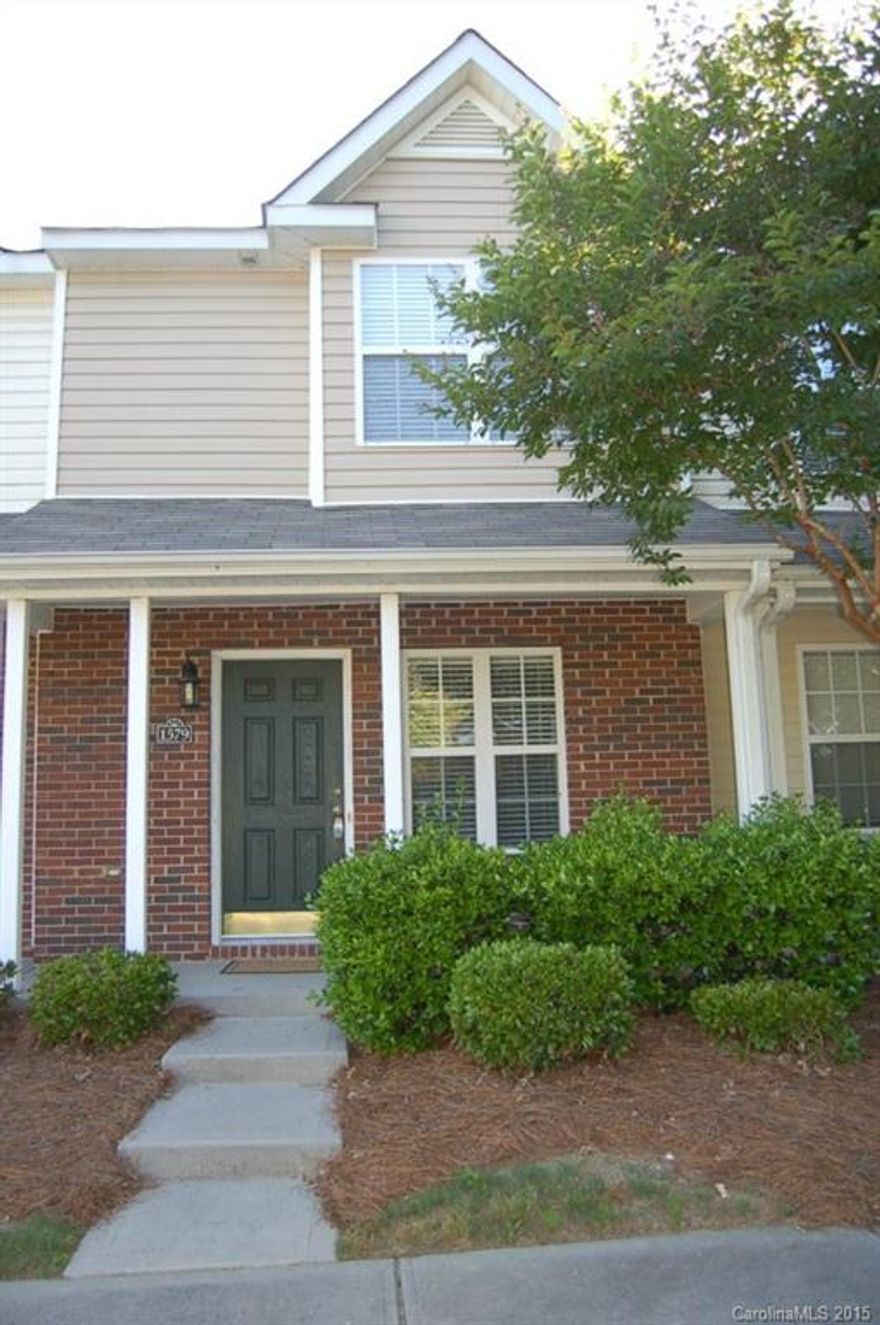 Wonderful townhome that is move in ready!  Large spacious kitchen with all appliances overlooking dining room and family room. New laminate wood flooring on main level.  Two master suites on the upper level with newer carpeting.  Perfect location in the back of the property with wooded views.  Community pool and sidewalks!  Easy access to I-77, shopping, and restaurants.