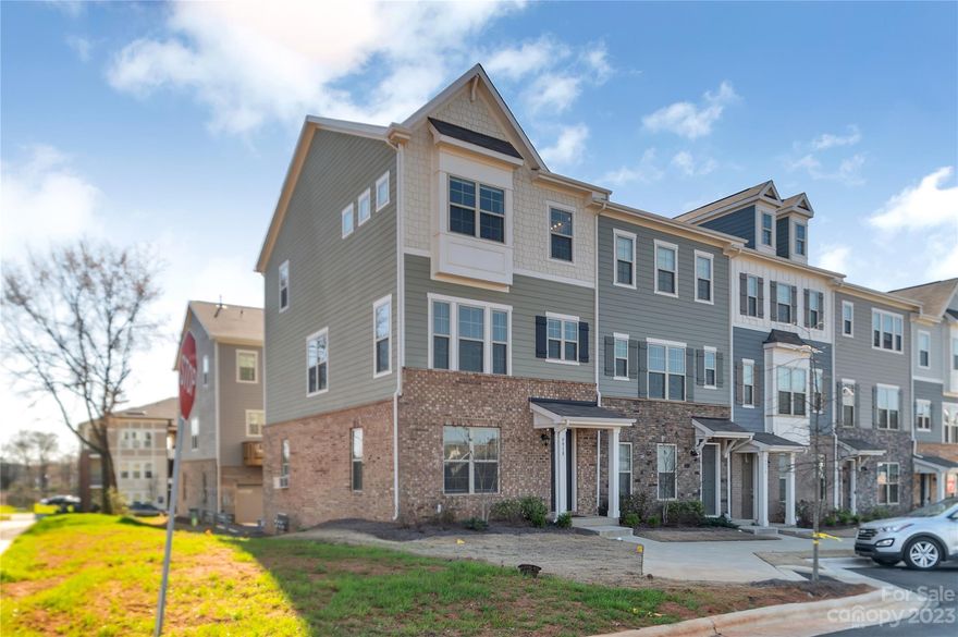 Welcome to 9918 Ainslie Downs Street!  This stunning three-story end-unit townhome located in the highly sought-after Hadley community. Get ready to be a part of all that Charlotte has to offer, as this home is conveniently located along the Light Rail, just a short walk from the Arrowood Station. As you step upstairs, you'll be greeted by a bright and open living area, complete with soaring ceilings and plenty of natural light. The adjacent kitchen boasts sleek countertops, modern appliances., and for outdoor space an amazing second floor balcony. Upstairs, you'll find the luxurious primary suite, featuring a large walk-in closet and an en suite bathroom with a double vanity and oversized shower. The three additional bedrooms are equally spacious and offer plenty of room for rest and relaxation. This Is A True Must See Opportunity Book A Showing Today!