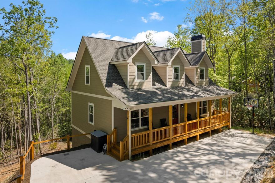 Looking for Peace? Tranquility? Move in ready? This Turn key, rarely available, custom built new construction home located in the exclusive Catawba Falls Preserve community (with direct Catawba Falls waterfall trail) access checks all the boxes. Situated on over 1.5 acres with winter views, forest views and the upper ridge of the community year round. This professionally decorated  home is being sold fully furnished and outfitted- what you see is what you get, everything is included. This home was thoughtfully designed to be a full time or seasonal residence, but is also ready to be a successful, vacation rental investment. This home is an active, cash flowing short term rental with a high occupancy rate.  The owners designed this home with functionality in mind, noticeable at every turn while walking through the over 3000 square feet of living areas and the expansive outdoor spaces. 

Boasting 5 furnished bedrooms plus a den (used as bedroom 6 for rentals), 3.5 bathrooms and a fully finished (daylight) basement, this home allows families to spread out. The basement has outside access to a thoughtfully designed private hot tub. The  game room comes outfitted with a regulation ping pong table, foosball table and cards table. The level includes two bedrooms, one being a separate master suite with en-suite bathroom, a living room and the recreational area. The main level of the home has two decks, front and back, fully equipped with a propane fire pit, barbecue and ample seating areas. The elegant custom stone, wood burning fire place adds to an open living room that leads to a fully custom kitchen. The kitchen features high end upgrades including soft close cabinets, wine rack, farm sink and upgraded appliances. The main level has a master bedroom with ensuite bathroom as well. The upper level is rounded out with two more bedrooms, a den, full bathroom and five active gable dormers adding to the mountain living vibes. 

The exterior of the home features upgraded landscaping, an in ground basketball hoop and ample parking for multiple vehicles.  The home is situated below street level offering supreme privacy and the owners have invested in clearing a usable large backyard space. 

Catawba Falls Preserve is a gated community with great proximity to Chimney Rock park, Chimney Rock village, Lake Lure and downtown Asheville. The community center and playground round out the area. Other upgrades include stained outdoor decks, tongue and groove ceilings, enhanced plank floors throughout all levels, upgraded led lighting and a full WiFi package- door bell, door lock and camera system. Don't miss out on your chance to own your slice of mountain serenity, this won't last long.