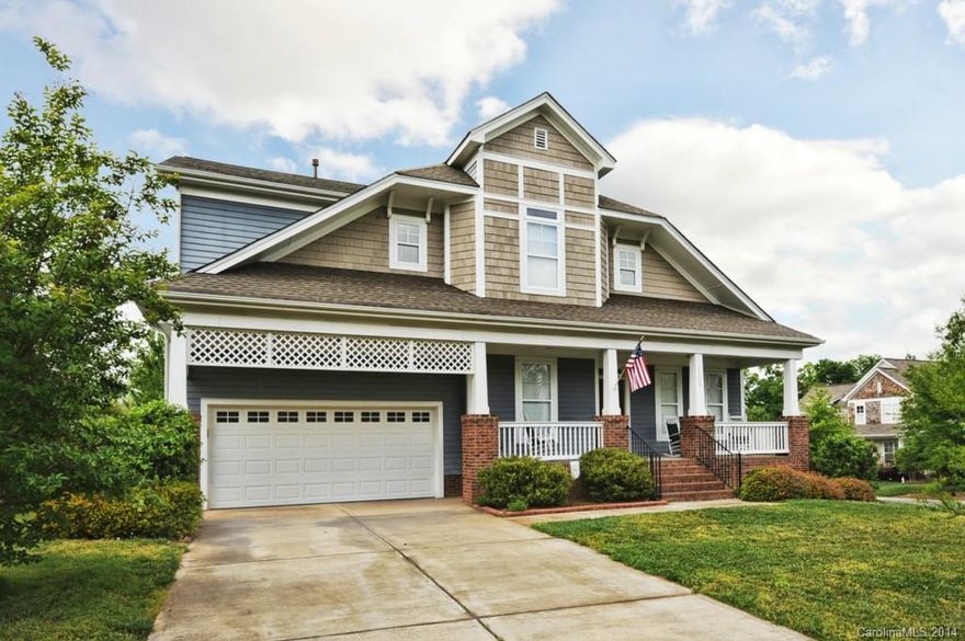 Hard to find level play yard, fenced.  Home is on .4 acre lot in Lake Shore.  Enjoy lake living, golf course, walking trails and so much more.  Nicely appointed with a bright kitchen, granite counters, neutral palette.  Master on Main, spacious bedrooms, large bonus.  Lots of storage, easy move in!  Zoned to new Tega Cay elementary, vacation lifestyle in an established sought after neighborhood.  Walk to parks, active recreational community with organized sports, clubs, activities for all.