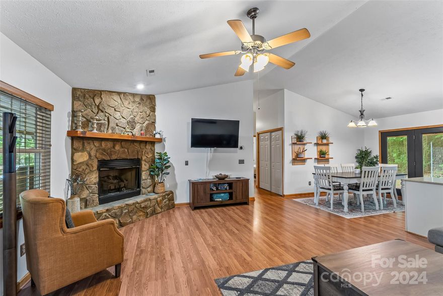 Get ready to LOVE what you see! Breathtaking long-range views can be seen year round from the spacious deck located at 128 Pony Drive! There is plenty of room to enjoy the outdoors on the porch, but inside is just as inviting. Two bedrooms with an additional rec room (currently has bunk beds) and two full bathrooms, main level living, gas logs in the living room, an extra den off of the rec room, and a handy shed outside - space and storage are not an issue here! 20 minutes to Maggie Valley, Waynesville, Lake Junaluska, and the home is easy to access - AWD is not required. Currently used as a successful vacation rental and guests LOVE the home. So will you! Furnishings can convey. Please note - exterior photos will be updated soon as landscaping has just been completed.