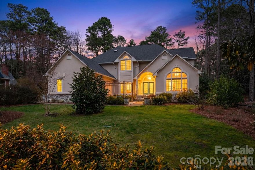 Beautiful custom home in the highly desirable Chesley neighborhood of Chapel Hill, offering nearly 3,800 square feet of thoughtfully designed living space on a private, landscaped .59-acre lot. This 5-bedroom, 4.5-bath home features elegant architectural details, soaring ceilings, abundant natural light, and spacious living areas perfect for both everyday living and entertaining.

The well-appointed kitchen offers granite countertops, ample cabinetry, and generous prep space, opening to inviting living and dining areas. A main-level bedroom with its own private bathroom provides excellent flexibility for guests, extended stays, or a home office.

Upstairs, the spacious primary suite serves as a relaxing retreat with its own fireplace, sitting area, and access to a covered porch. Additional features include hardwood flooring, skylights, walk-in closets, and thoughtfully designed spaces that create a comfortable flow throughout the home.

Enjoy outdoor living in the large fenced backyard surrounded by mature landscaping, offering privacy and room to relax or entertain. The oversized 3-car garage includes built-in shelving and additional storage space above, providing exceptional storage and functionality.

Located in a sought-after area with top-rated Chapel Hill–Carrboro schools, and convenient access to shopping, dining, parks, and the University area, this home offers an outstanding combination of location, space, and timeless appeal.