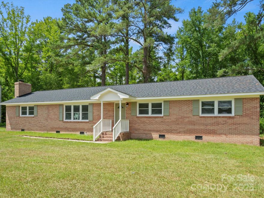 What an opportunity! Sitting on close to 2 and a half acres, this brick, 1786 sq. ft., 3BR/2BA, has been through a total transformation! You'll feel comfortable knowing there is a new floor system, roof, HVAC, windows, septic line, and hot water heater. The electrical and plumbing have also been completely updated. Both bathrooms, along with the kitchen, have been attractively remodeled, too. The home has great flow and nice options for living and dining areas.  The columns in the kitchen add special interest and appeal.  This one is COMPLETELY move-in ready! Make an appointment to see it soon! *Actual physical address is 45 Isgett Circle which is not found in the Canopy system. The extra adjacent lot faces Laney Road*