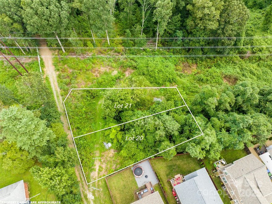 This rare .11-acre lot is one of the last two available in a well-established Oakley subdivision! Enjoy mountain views, a peaceful cul-de-sac setting, and nearby open land perfect for walking and play. Conveniently located just 4 minutes from downtown Asheville, you’ll have quick access to shopping, dining, and entertainment, while still enjoying a sense of community and tranquility. Outdoor enthusiasts will love being only 2 miles from the Mountains-to-Sea Trail, offering miles of scenic hiking and exploration. With city water and sewer hookups nearby, this lot is primed for easy development, making it the perfect spot to build your dream home. Whether you're seeking mountain views, urban convenience, or outdoor adventure, this location offers it all. Don’t miss this rare opportunity to own in one of Asheville’s most desirable neighborhoods—secure your spot in this charming community before it's gone!