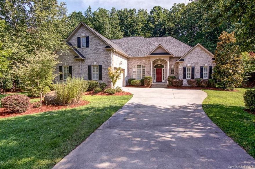 Full brick 3 BR, 3.5 BA home in Hamilton Crest (could be expanded via Septic permit to a 4BR) + office & bonus room. Secluded 1.21 acres! Maple hardwd flooring, vaulted ceilings & plantation shutters. Open Flrplan w/ master on main and natural light. Kitchen has custom maple cabinetry, S/S appliances & granite counters w/ tile backsplash. Pvt patio, 9-zone S/S irrigation system & wooded back yard! Freshly painted & move-in ready! Home Warranty included! Desirable Cabarrus Co schools & low taxes!