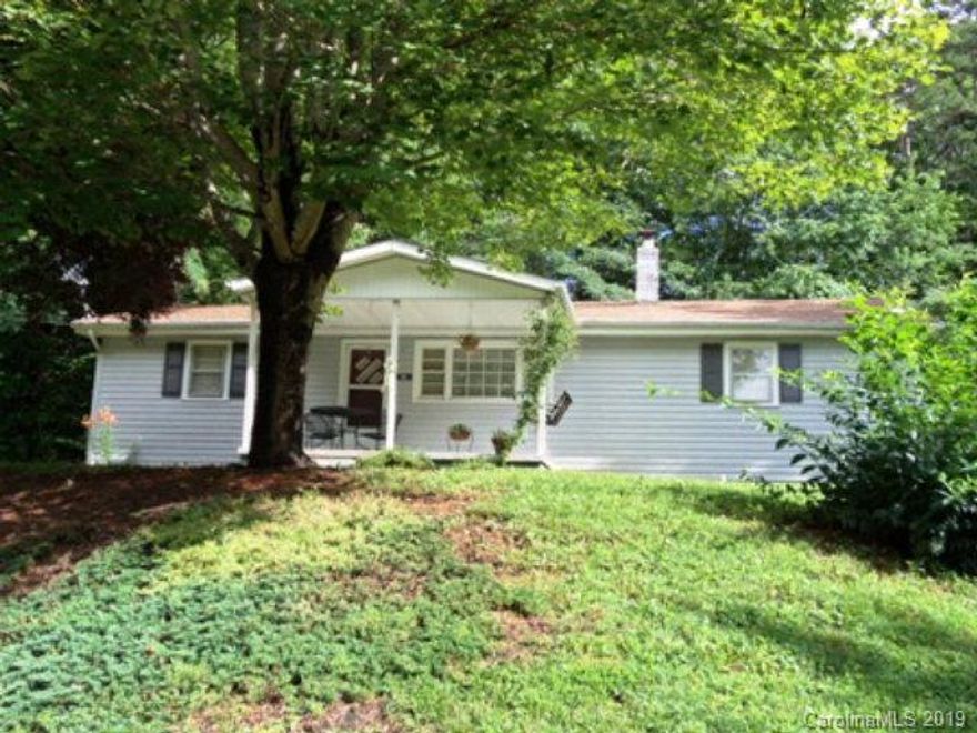 WITHIN 5 MINUTES to LAKE JAMES and MARION LAKE CLUB GOLF COURSE, this property features original hardwood floors.  Great starter home, vacation home or downsizing.  All on main level. Several improvements since owner purchased property include: vinyl siding, paint, dishwasher installed, septic and drain lines, roof (2013), remodel half bath, some new fixtures and some new windows replaced.  Quaint starter home or downsize.  Nice covered front porch. Small fenced area for pets.