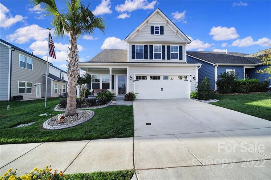 Avoid new construction concerns with this immaculate, move-in ready 3BR/2.5BA home in the highly sought after Edgewater Community.  Eliminate the uncertainty of costly upgrades, contractor mistakes and delays.  No upgrades needed!  Large kitchen comes w/ stainless appliances, quartz countertops, gas range w/ 2 ovens, upgraded cabinets w/pantry, & large kitchen island.  Custom-tiled great room features a gas fireplace & backyard views from the comfort of a three-season porch.  Primary bedroom comes with en suite bath, walk-in shower & large walk-in closet.  Second story has 2 bedrooms & a loft that can double as an office.  The exterior is beautifully landscaped w/ palm trees, stamped concrete edging, privacy fence & rear patio for outdoor grilling.  Epoxied garage, full-house water filtration & much more!  Come see what this community has to offer - marina w/ boat slips f, RV storage, golf course,pool, tennis, lakeside pavilion, and rec center with an activity calendar each month!