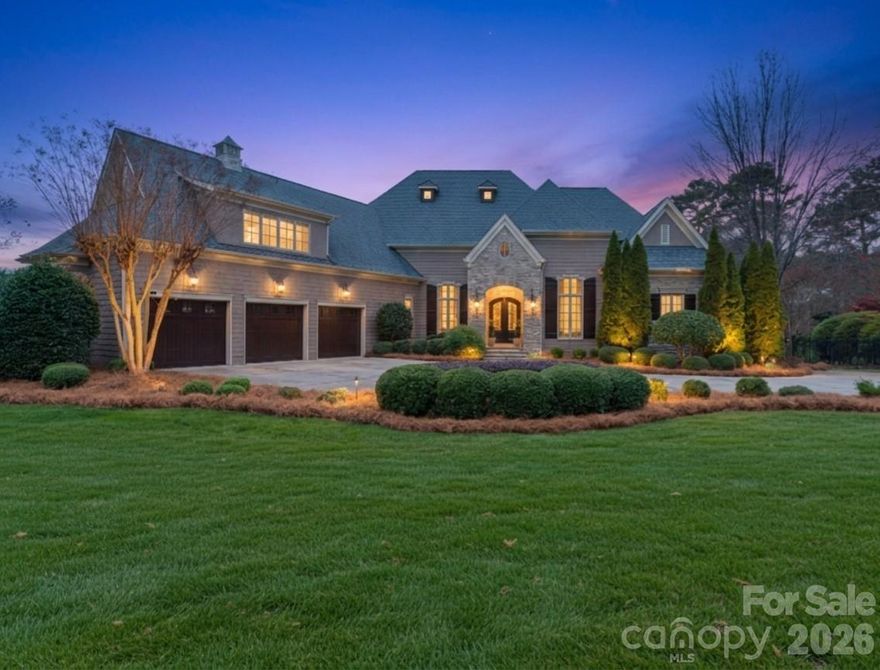 Experience refined luxury living in The Point, one of Lake Norman’s most prestigious golf and waterfront communities. This exceptional estate offers 5,177 sq. ft. of thoughtfully curated living space on a beautifully landscaped lot overlooking the 2nd tee box of Trump National Golf Club.  Outdoor living is truly resort-style, featuring a stone patio with gas fireplace, pool and spa, fully fenced yard with privacy landscaping, custom built-in BBQ area with sink and storage, and a dedicated fire pit seating area - perfect for entertaining or relaxing evenings.  Inside, a gracious foyer opens to soaring living and dining spaces with 12-foot ceilings, setting the tone for elegant everyday living. The main level features a private office with French doors and vaulted ceiling, along with a serene primary suite complete with a spa-like 5-piece bath and spacious walk-in closet. Two additional bedrooms share a Jack & Jill bath, offering both comfort and privacy.  The chef’s kitchen is designed for both function and entertaining, featuring a large island with seating, built-in refrigerator, gas cooktop, beverage fridge, walk-in pantry, and a breakfast area overlooking the backyard retreat. The inviting family room with tray ceilings and gas fireplace flows seamlessly into a hidden private guest suite - complete with bedroom, full bath, sitting room, and direct patio access - ideal for guests or multi-generational living.  Upstairs to that area includes a versatile loft/yoga, half bath, and a spacious bonus/media room above the 3-car garage with full bath provide flexible living options. Recent upgrades include a 2020 guest-suite addition built by Augusta Homes, septic expansion to 5 bedrooms, pergola, fire pit, new carpet, exterior lighting, and fresh exterior paint in 2025.  This property also includes a deeded boat slip (Pier Z, #14), providing direct access to Lake Norman’s 520 miles of shoreline.  A rare opportunity to own a home that seamlessly blends golf, lake, and luxury living—now offered at an exceptional value.