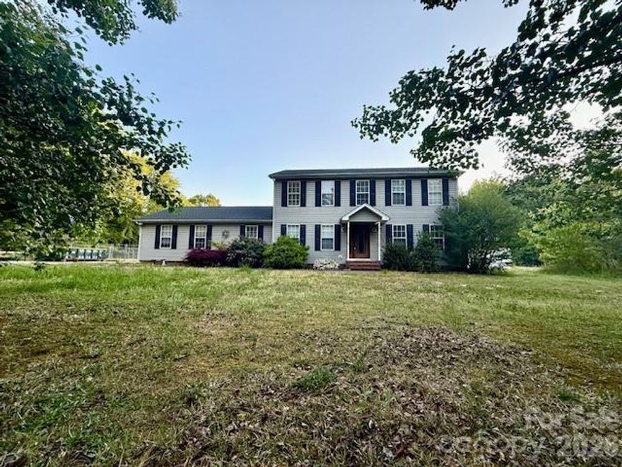 WOW!!!! Amazing home with oversized built in pool and diving board! Pool is estimaed to be over 34,000 gallons....massive pasture total land is almost five acres!! and older survey is attached in documents This place is super secluded and even has a recorded private road. Priced accordingly - home requires paint some floor coverings upstairs and HVAC repair. Rare rare find. Easy to show.