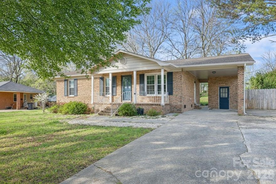 Rare opportunity to take advantage of an assumable VA loan with an incredible 2.75% interest rate for qualified buyers, offering significant potential savings compared to today’s rates!  This beautifully remodeled 3BR, 1 BA home welcomes you with a bright, open floor plan with hardwoods in main living areas.  Designed for comfortable everyday living and easy entertaining. Stunning updated kitchen with granite counters, subway tile backsplash, white cabinetry and SS appliances. A cozy sunroom just off the main living area is filled with natural light, creating the perfect spot for morning coffee, reading, or relaxing at the end of the day. The fully updated bathroom features a spacious tiled curb-less shower with a folding teak bench, dual vaniy sinks and tiled floor.
Step outside to a wonderfully fenced backyard shaded by mature trees, providing a peaceful setting for summer gatherings, pets, or simply enjoying the outdoors. A large storage shed offers abundant space for tools, lawn equipment, or hobby storage.

Location is a standout—situated on a quiet street in a desirable neighborhood just seconds from Cherry Rd and Anderson Rd, with convenient access to Interstate 77. You’ll also be just minutes from shopping, dining, and entertainment at Rock Hill Galleria and the restaurants, shops, and charm of Downtown Rock Hill. This home offers updates, comfort, and a highly convenient location—making it a must-see!