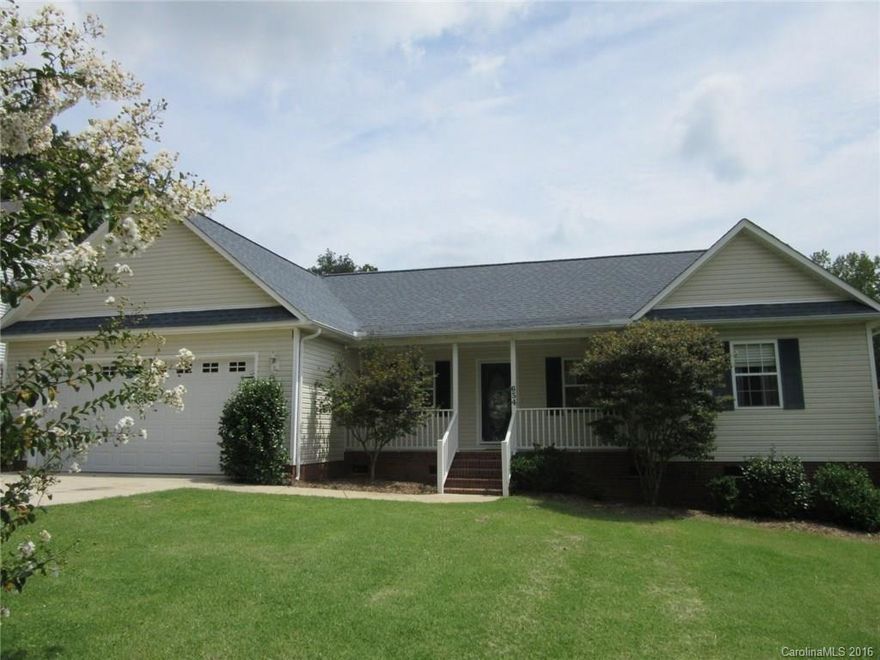 This House has a wonderful floor plan, very open, with breakfast bar, pantry, tray ceilings, sun room, large bedroom with vaulted ceiling with huge master bath, his and her separate closets, double vanities, garden tub and separate shower.  2 other bedrooms at the opposite end of house with additional bath, laundry is in hall closet, double garage, presently has a handicap ramp in garage for easy access (This can be removed)
cemet drive, front porch, deck and storage building, a must to see