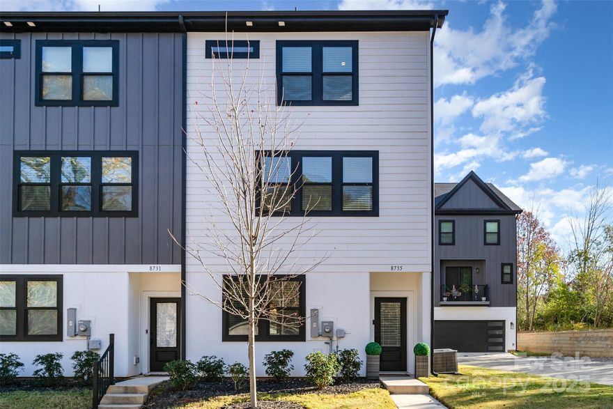 Experience luxury living in this stunning three-story end-unit townhouse, ideally located just minutes from Charlotte and downtown Matthews. Offering 4 bedrooms and 3.5 bathrooms, this beautifully designed home combines space, style, and sophistication with everyday convenience.

The main level features a two-car garage and a private guest suite with a full bath—perfect for visitors or a home office. The second floor showcases a bright, open-concept living area with a beautifully appointed kitchen, complete with a large center island with bar seating, stainless steel appliances, and custom wainscoting details. Abundant natural light and a balcony create seamless indoor-outdoor living.

Upstairs, the spacious primary suite provides a serene retreat with a spa-like ensuite bath, while two additional bedrooms share a full hall bath and a conveniently located third-floor laundry.

Centrally located near major highways and Interstates, this home offers easy access to Uptown Charlotte, Matthews, and surrounding areas. Walkable proximity to everyday shopping, including Walgreens and Harris Teeter, along with dining, entertainment, and commuter routes. Thoughtful design, refined finishes, and an unbeatable location make this home ideal for effortless, modern living.