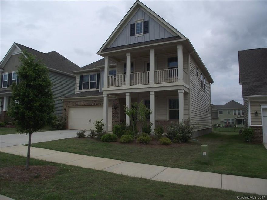 Like new! 5 bedroom & 4 full bathrooms in Waterside at the Catawba in Fort Mill. Large open Great Room with a gas fireplace. Stainless Steel appliances in kitchen with extra-large countertop island & eat-at counter. Gas stove, new refrigerator and large pantry. Hardwood floors, carpeting and tile floors.  Guest bedroom on the main level. Nice second floor balcony, front porch and patio in the back. Neighborhood community has new pool opening this summer with club house!