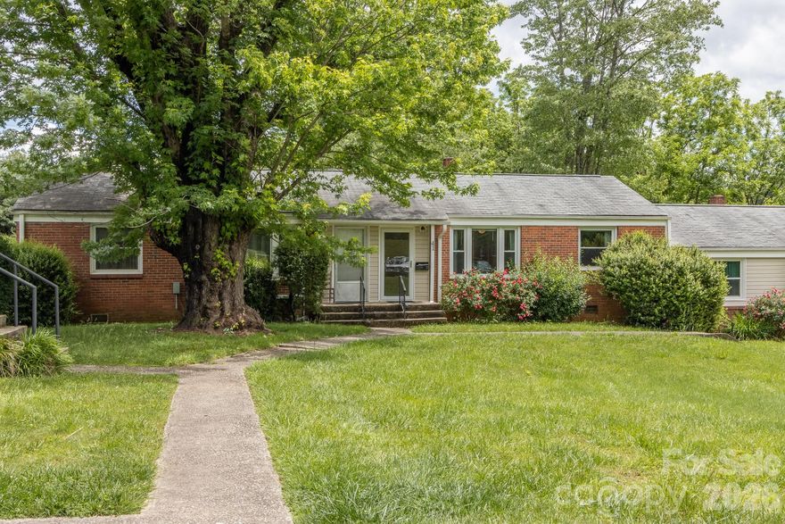 Ideally located condominium in the ever popular Sapphire Manor neighborhood. Authentic wood flooring and shiplap accent walls bring character to the living and bedroom areas. The galley style kitchen brings convenience and utility with the connected laundry room which could double as pantry space. The living area looks out over a nicely manicured greenspace and a back deck area or patio space could be added for outdoor entertainment.  The unit features a rear and front entry, and a covered parking bay off the back of the unit is a huge plus. One-level living, ease of access, and walking distance to everything downtown Brevard has to offer make this property a true gem.