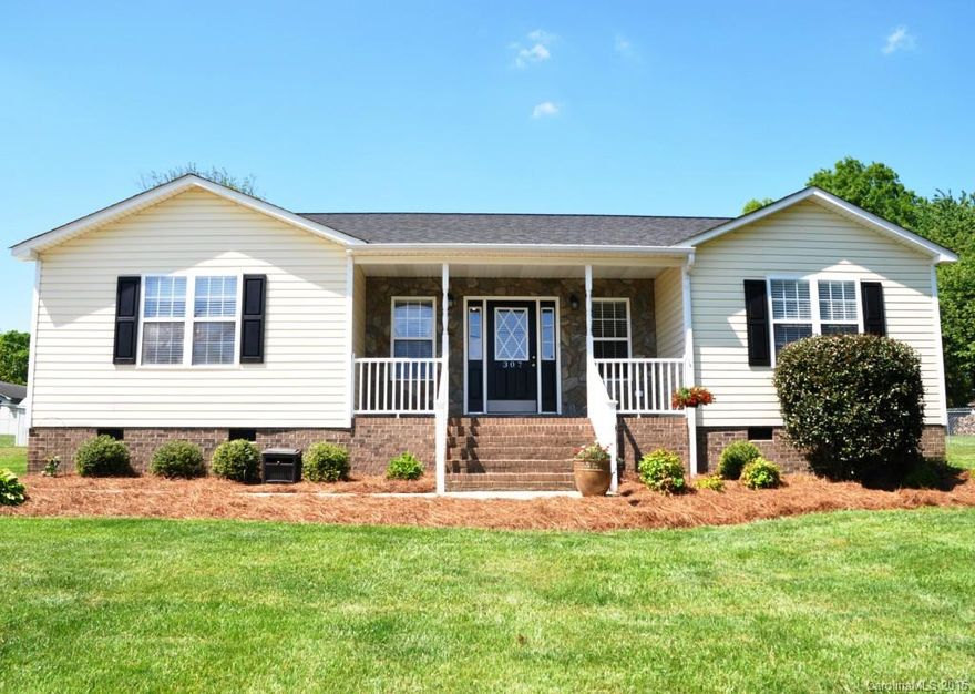 Just move-in to this tastefully refreshed ranch style home. Features include great room w/fireplace and cathedral ceiling. The large master suite features a tray ceiling and walk-in closet. When it's time to relax, just have a seat on the covered deck located in the fenced back yard.