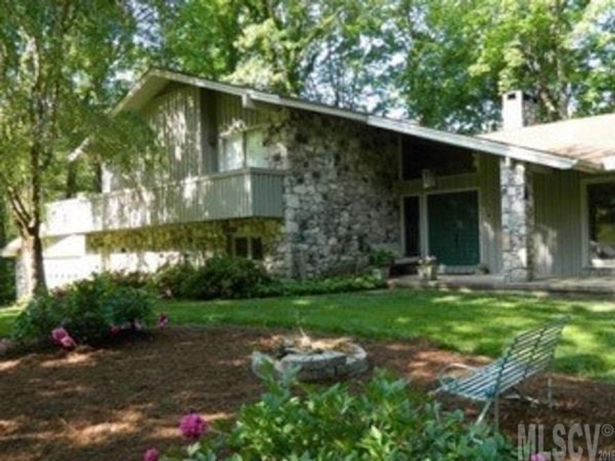 Beautiful mountain style home overlooking the #5 fairway at Cedar Rock Country Club. Spectacular views and a perfectly manicured yard leads to the expansive open floor plan which boasts a gourmet kitchen, including commercial grade gas cooktop, stainless steel double oven and granite countertops. Home offers cathedral ceiling, hardwood floors and custom cabinetry. Enjoy the wet bar, entertain in the rec. room, or relax in the sunroom or screened-in porch.  New roof and new Trane heat pumps were installed in 2013.