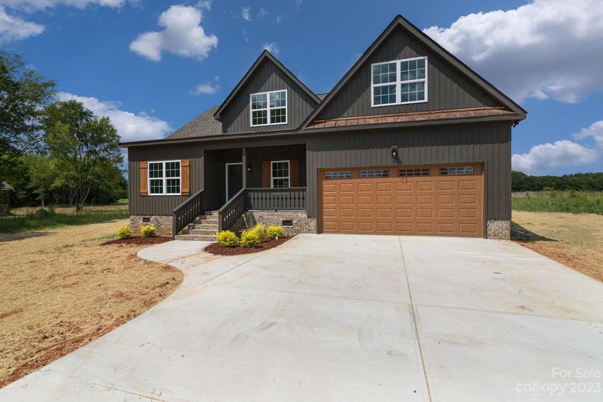 This is home is the TOTAL opposite of everything dark, gloomy, and mysterious. Boasting a dark vinyl exterior and  it's moody color palette, this expertly designed home is sure to be bright, cheery, and open for all of the joys of life. As the final part of this trio of homes built by the same builder on Rambo Road, this 4 bedroom/3 bathroom/BONUS ROOM home is one to remember. Complete with a ship lap, cathedral ceiling and a wonderful catwalk, the entry and the areas to follow will leave you breathless. Contrasting trim colors and wonderfully appointed finishes throughout make 278 E. Rambo anything but dark and dreary. There is a wake board park across the way and minutes away from all other Rock Hill amenities. Schedule a showing today!