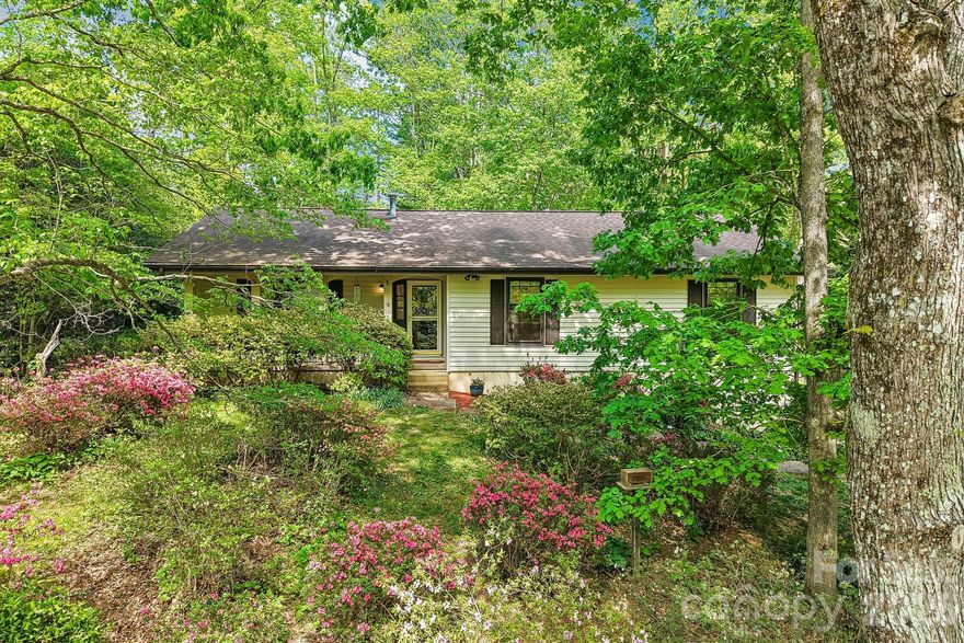 Discover this beautiful home in one of Arden’s most charming neighborhoods. St. Andrews features quiet cul-de-sacs throughout and a welcoming, neighborly feel. Just a five-minute walk from your front door leads to the trailhead of Collier Cove Nature Preserve—perfect for an easy hike anytime. This home welcomes you with gorgeous bamboo flooring, a spacious updated kitchen, a bright four-season sunroom perfect for morning coffee, and a large back deck ideal for entertaining. Relax under mature maple trees in the fully fenced backyard or let your fur babies safely run and explore! The expansive, basement with conditioned space provides incredible flexibility for storage or additional living space. Conveniently located just minutes from Gerber Village, Whole Foods Market, and Jake Rusher Park, this home also falls within the highly regarded Glen Arden school district.
