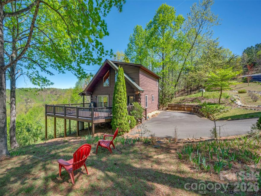 Tucked away in the gated community of Yellowtop Mountain Estates, this charming mountain log cabin offers the perfect blend of peaceful seclusion and breathtaking long-range views. Situated on two combined lots totaling 3.09 acres, this 2BR/2BA retreat provides added privacy, space, and future flexibility. Inside, you’ll find warm wood interiors, a cozy stone fireplace with gas logs, and an open, inviting layout ideal for relaxing or entertaining. Enjoy your morning coffee or evening sunsets from the porch while taking in the beauty of the Blue Ridge Mountains. Whether you're searching for a full-time residence, weekend escape, or a potential income-producing rental, this property offers the best of mountain living. Being sold fully furnished, this home is truly move-in ready or rental-ready from day one.