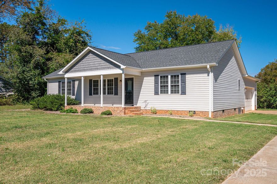 Look no further—this exceptional home offers refined living in a peaceful, private setting. Nestled on over an acre in a quiet neighborhood, this meticulously maintained home features an open, light-filled floor plan with spacious rooms and a thoughtfully designed split-bedroom layout. Premium luxury vinyl plank flooring and LED lighting flow throughout the home, creating a modern and cohesive feel. The gourmet kitchen showcases a large island, perfect for entertaining or casual dining. Each bedroom boasts an impressive walk-in closet, providing abundant storage and comfort. Outside you will find plenty of room for recreation and entertaining. The two-car garage and tranquil surroundings make this home a true retreat. Enjoy the advantages of no city taxes, yet the convenient location puts you minutes from shopping, restaurants and entertainment.