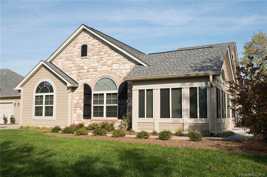 Must see this gorgeous condominium wit many stunning upgrades. Brand new look & feel. Beautiful granite kitchen counter tops w/Bosch stove & microwave. Vaulted ceilings throughout. Great room has attractive gas FP, French doors to sun room. Private end unit w/wooded view. Security system. Within minutes to dining, shopping, I-77, Charlotte, Rock Hill, Tega Cay is rich with many amenities!