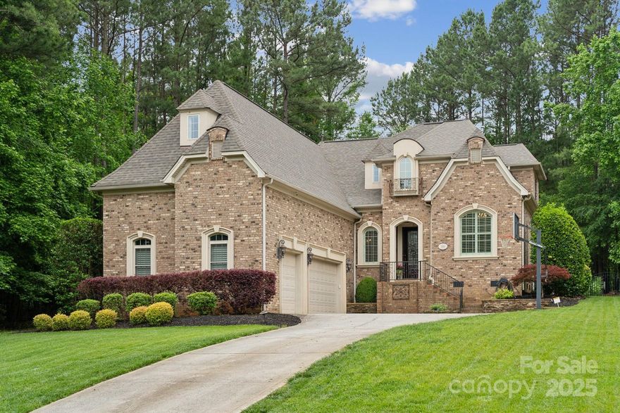 Palm Tree Cove is a boutique, custom built community on Lake Wylie. HOA includes boat storage, pool & walking trails. This all brick home has so much attention to detail!10" crown molding throughout (even in closets and the pantry!) Cozy painted rock fireplace in family room as well as built ins and surround sound. Plantation shutters on all front windows. Gorgeous primary suite on main level w/ double walk in closets. Projector/media equipment & screen in the media room/5th BR to remain. Central vac system, alarm system, new roof 2022,HVAC new downstairs 2024,sealed crawlspace w/ dehumidifier. Walk in pantry, updated appliances & 9 new windows...move in ready! Tons of storage including 3 walk in spaces, side storage in media/5th BR & 3 additional walk in closets. Mature landscaping & trees w/ fenced rear yard for privacy. Experience the peace and serenity of lake life just 5 minutes from the Allison Creek Landing Pier & Boat Ramp,30 minutes to Charlotte & only 25 minutes to Rock Hill!