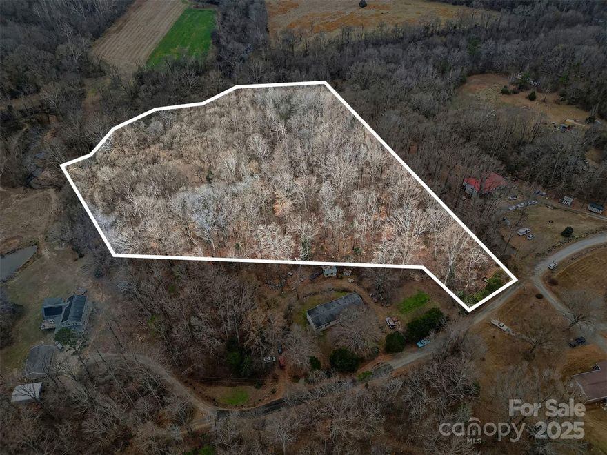 Perfect setting for your country home on just over 8 acres! This beautiful wooded property in Stanley offers privacy, nature, and peaceful living tucked away from the hustle and bustle. A charming creek runs along the back of the property, creating a serene, natural backdrop. Enjoy the feeling of being secluded while still being just minutes from shopping, dining, and conveniences along Hwy 16 and Hwy 73 in the new Denver area. A wonderful opportunity to create your dream home surrounded by nature.