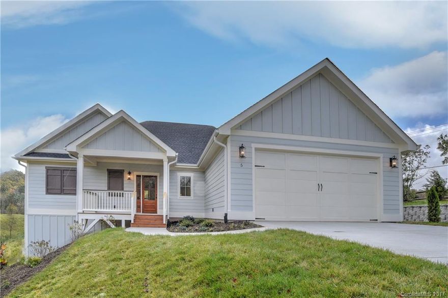 Gorgeous New Construction w/Spectacular Mtn Views & Incredible Sunsets In A Desirable Upscale Neighborhood. Superior Features Throughout w/A Spacious Open Floor Plan,Awesome Living-Dining & Entertaining Area,Classy Kitchen w/Stainless Energy * Apls,Walk-In Pantry,Mstr Suite w/Back Porch Access,Massive Walk-In "Dream" Closet, Tiled Mstr Bath w/Soaker Tub,See Through Fireplace to Back Porch,Oversized Garage,2000 Sq ft of Unfinished Daylight Basement,Great Yard for Kids & Pets. Mins TO DT Asheville
