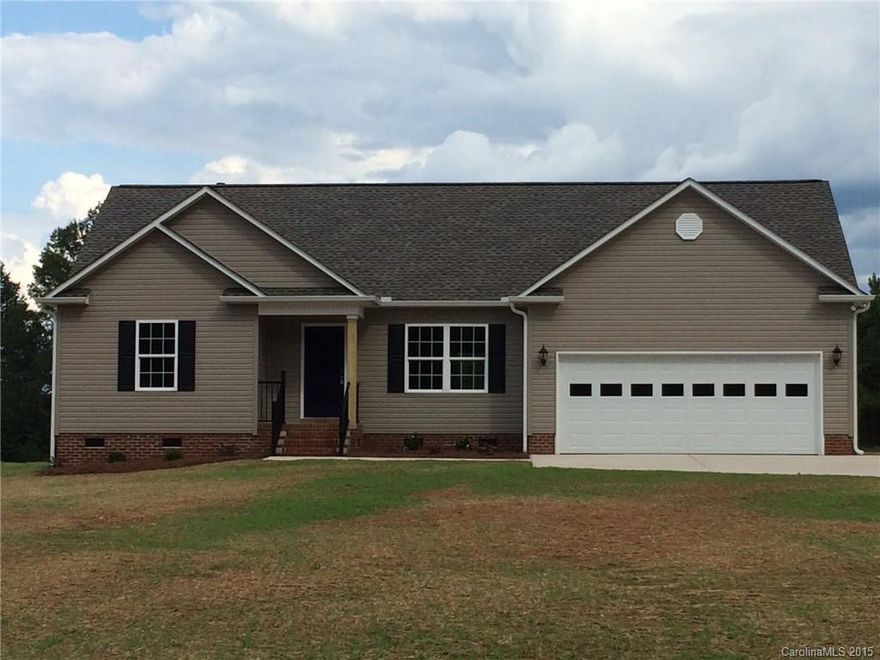 New Construction! Nice country setting not too far from town. Close to schools and shopping without city taxes. Hardwoods in main living areas, gas log fireplace, gas range, 3BR/2B, & attached 2 car garage all sitting on a large 1.62 acre lot in a USDA 100% financing area!