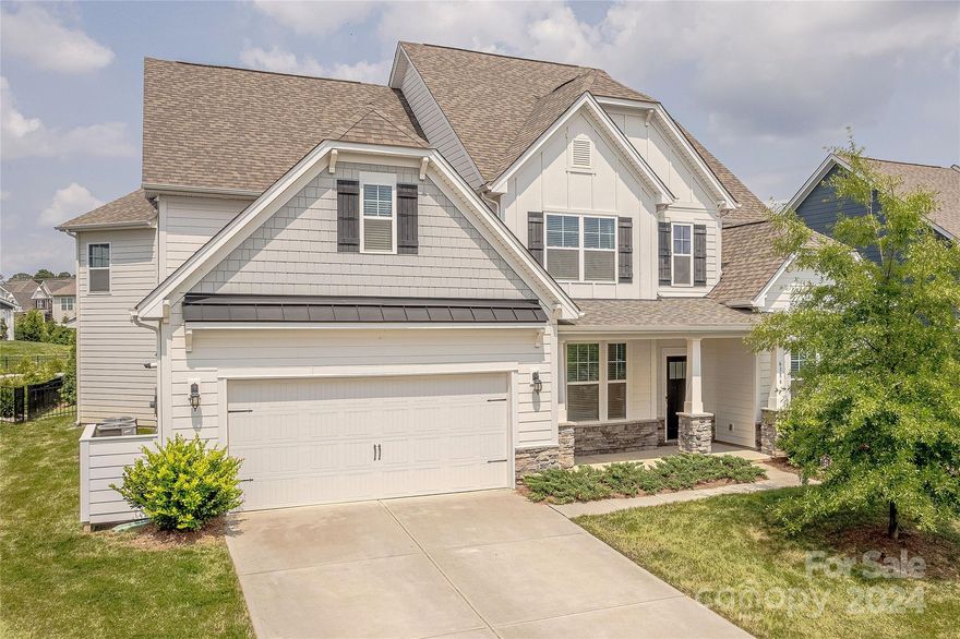 Situated on one of the largest lots in desirable Avondale, this 5 bedroom home spans over 4100 square feet & is move-in ready. Rocking chair front porch leads to grand open 2-story foyer flanked by formal dining room & flexible living room w/custom built-in shelving. Glass door study is perfect for home office. Gourmet chef’s kitchen features ample 42” white cabinets, quartz counters, Frigidaire appliances including wall oven & 4-burner gas cooktop w/ exterior venting hood.  Convenient guest suite on main w/ en suite bath. Enormous primary suite offers sitting area & spa-like bath w/ separate dual vanities, glass enclosed tile shower, garden tub & huge walk-in closet.  Bedroom three has private en suite bath while bedrooms four & five are finished with designer details & share a Jack n Jill bath with dedicated private vanity areas.  Generous bonus room on second floor.  Venturing outside a travertine tile patio has covered area, built in grill & firepit overlooking the huge flat yard.