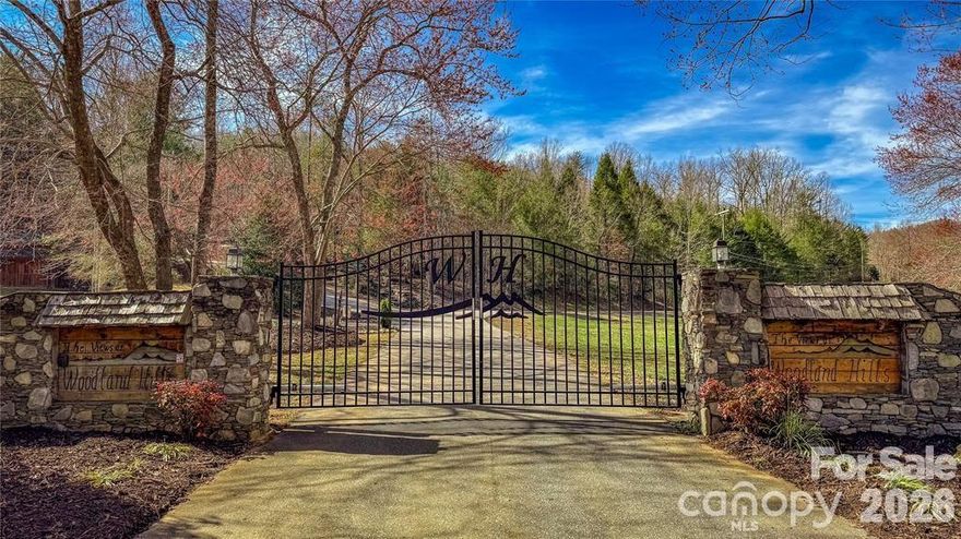 Discover the perfect blend of privacy and convenience with this 1.19-acre wooded lot in the desirable gated community of The Views at Woodland Hills. Boasting stunning north-facing mountain views, this lot offers the ideal backdrop for your dream retreat. Enjoy a peaceful, country setting while being just minutes from I-40, making it an easy drive to town. The neighborhood features beautiful homes, low HOA fees, and great amenities, including a playground, basketball court, and mini golf, providing fun for friends and family. This lot has a septic permit and site testing already completed!! Bring your house plans and build your dream retreat!! Whether you’re looking for a serene escape or a convenient location, this property is ready to bring your vision to life. Don't miss the chance to build in this gorgeous mountain community! Please call for an appointment.