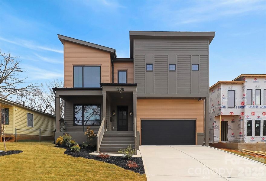 Stunning modern style 2 story home offering 4 bed / 3.5 bath with high end finishes and thoughtfully designed living spaces throughout. Enjoy abundant natural light and hardwood floors throughout the entire home – no carpet. Just off the foyer is a dedicated downstairs office with a custom barn door, plus a built in flex space with desk and cabinet storage. The open concept layout offers a spacious entertaining area that flows into the chef’s kitchen featuring a 10 ft waterfall edge island, 48 inch dual fuel range with griddle, custom hood, dueling wine coolers with wet bar, and a large walk in pantry. Upstairs includes a bonus or game room and generously sized bedrooms, each with its own en suite bath and large bathrooms for added comfort and privacy. The oversized primary suite offers skyline views and a spa inspired bath with a black soaking tub and large walk in shower. Additional features include a drop zone off the garage, painted 2 car garage with high ceilings, epoxy floors and side mount motors, laundry room with cabinetry and sink, and a tankless hot water heater. Relax on the covered back porch with a fireplace overlooking the fully sodded backyard. This home blends modern design, luxury, and everyday functionality. Just a short walk to Optimist Hall’s dozens of food stalls, bars, cafés and offers access to the LYNX light rail & the Little Sugar Creek Greenway. Come take a tour today!