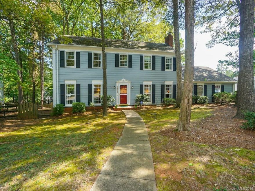 REDUCED! Corner Lot Home W/ Large WOODED FENCED Yard!  Home boasts 4 Bedrooms, A large MASTER BEDROOM W/Garden tub & walk in closets in the master suite!  A formal dining & living area as well as den with a WOOD FIREPLACE, Updated lighting throughout, ceramic tile, Newer Carpet & An OVER SIZED GARAGE, plus an additional 2 car parking pad & Large Outdoor Shed/Building. Centrally located just minutes to the Charlotte Airport & Uptown as well as short commute to LKN. Put this on the short list!