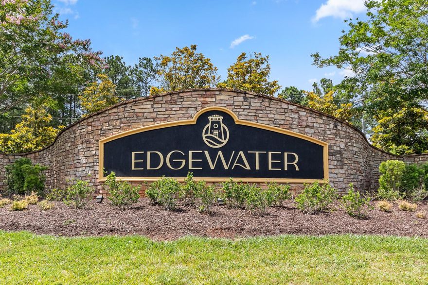 Don't miss out on the impressive views Edgewater has to offer. Directly across the street and easy walking distance is the community pool and pickleball courts.  Enjoy the long-range lake views just outside your front door and screened porch.  Open floor plan as you enter this 2 bedroom/2 full bathroom home.  Enjoy the covered and screened rear private porch or the covered front porch.  Spacious primary bedroom with tray ceiling, en-suite bathroom, walk-in shower and walk-in closet. The kitchen provides plenty of storage, granite counters, 36" cabinets & breakfast bar.  Two-car attached garage.  Schedule your showing today.